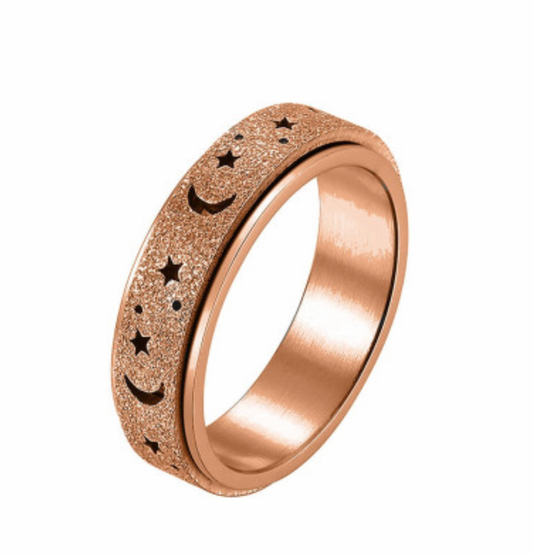 Anillo giratorio luna y estrellas rosa 🌙✨ – antiestrés y calma interior